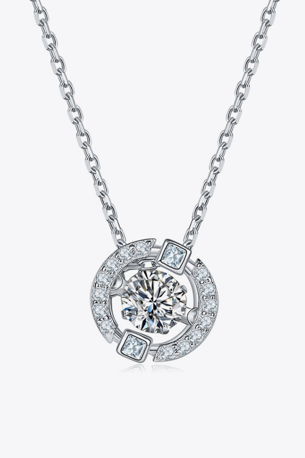 Moissanite pendant necklace on a fine silver chain, shown from the front.