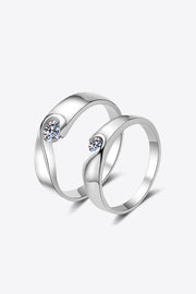 Two silver moissanite rings displayed together on a white background.