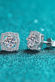1 Carat Moissanite Geometric Stud Earrings — Front view of geometric studs on teal background
