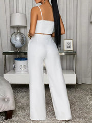 Back view of the white cami and wide-leg pants set, showing the smocked back.