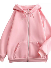 Front view of the pink hoodie showing the zipper, drawstrings and roomy silhouette