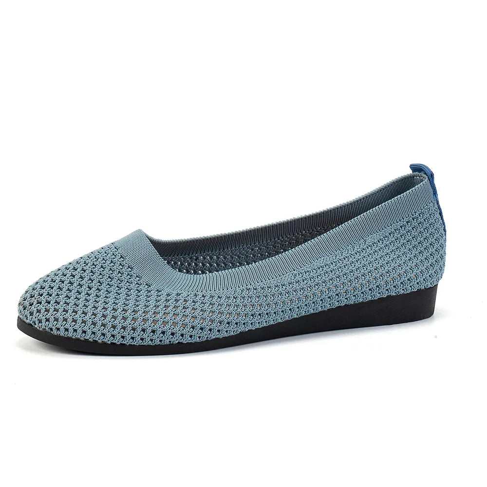 Pale blue mesh flat slip-on in side profile
