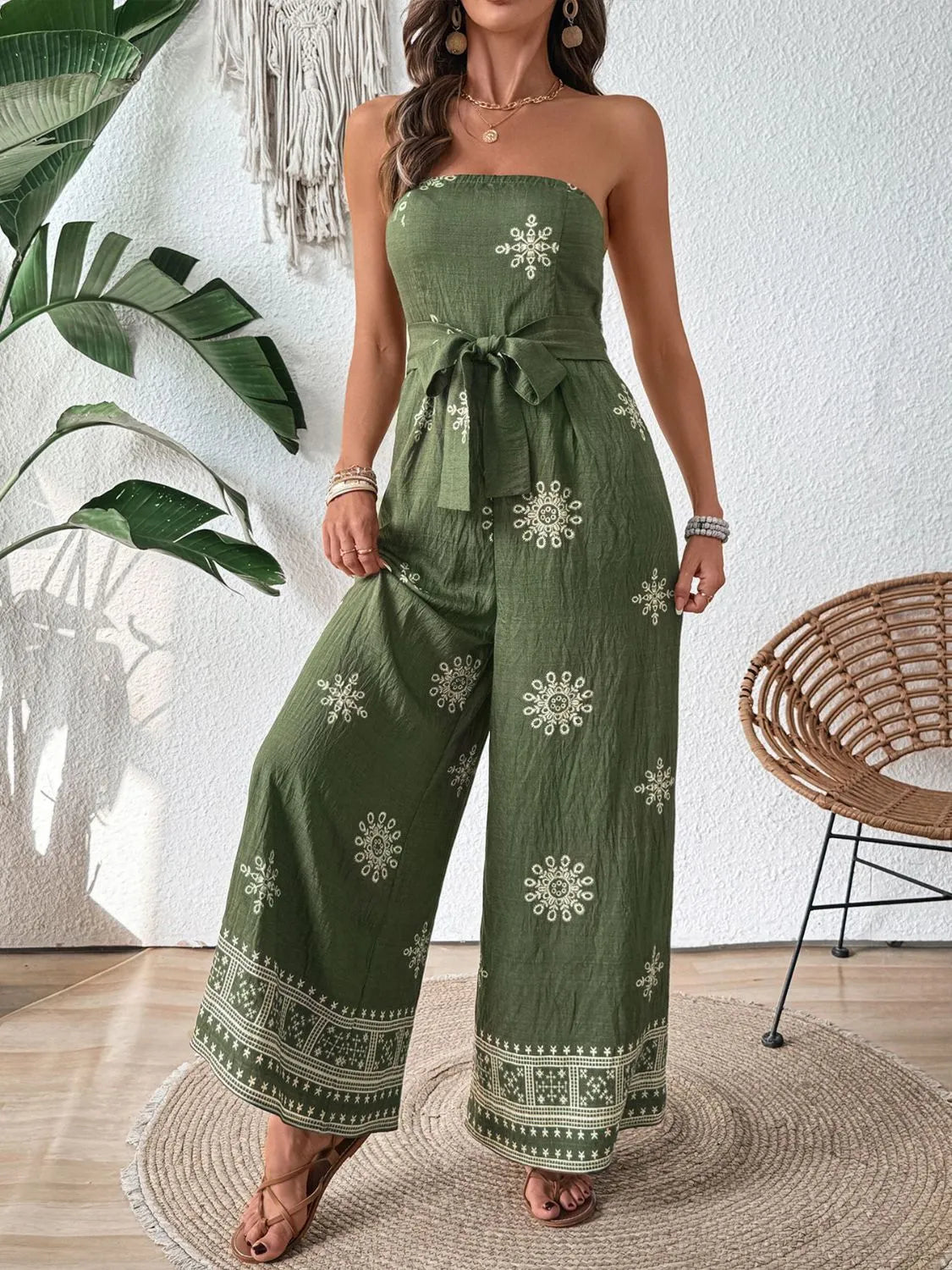 Full front view of strapless jumpsuit with wide legs