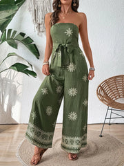 Full front view of strapless jumpsuit with wide legs