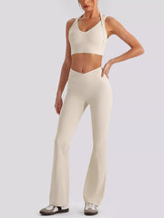 Three-quarter front view of seamless criss-cross v-neck tank and leggings active set