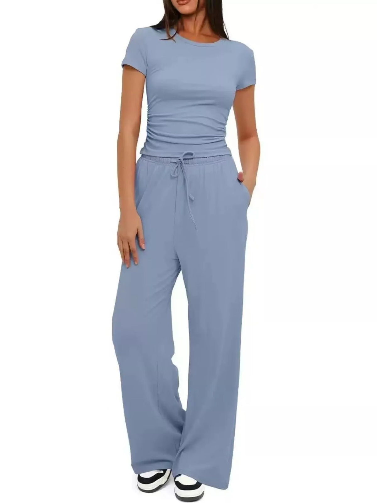 Front view of the light blue tank and matching wide-leg pants.