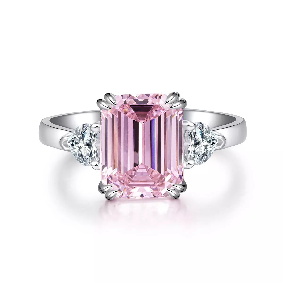 Front view of pink emerald-cut center stone ring with clear side stones