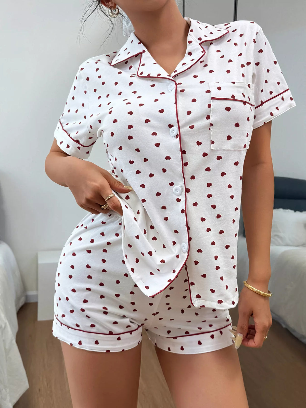 White heart-print button-down pajama shirt and matching shorts, front view