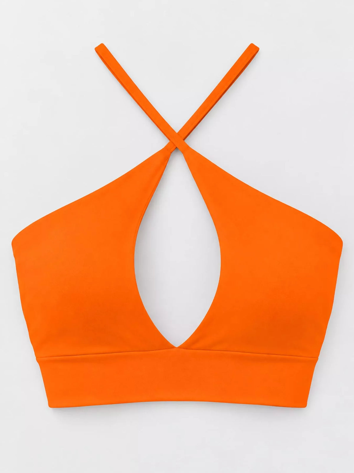 Back view of orange halter crop cami with thin crossed straps