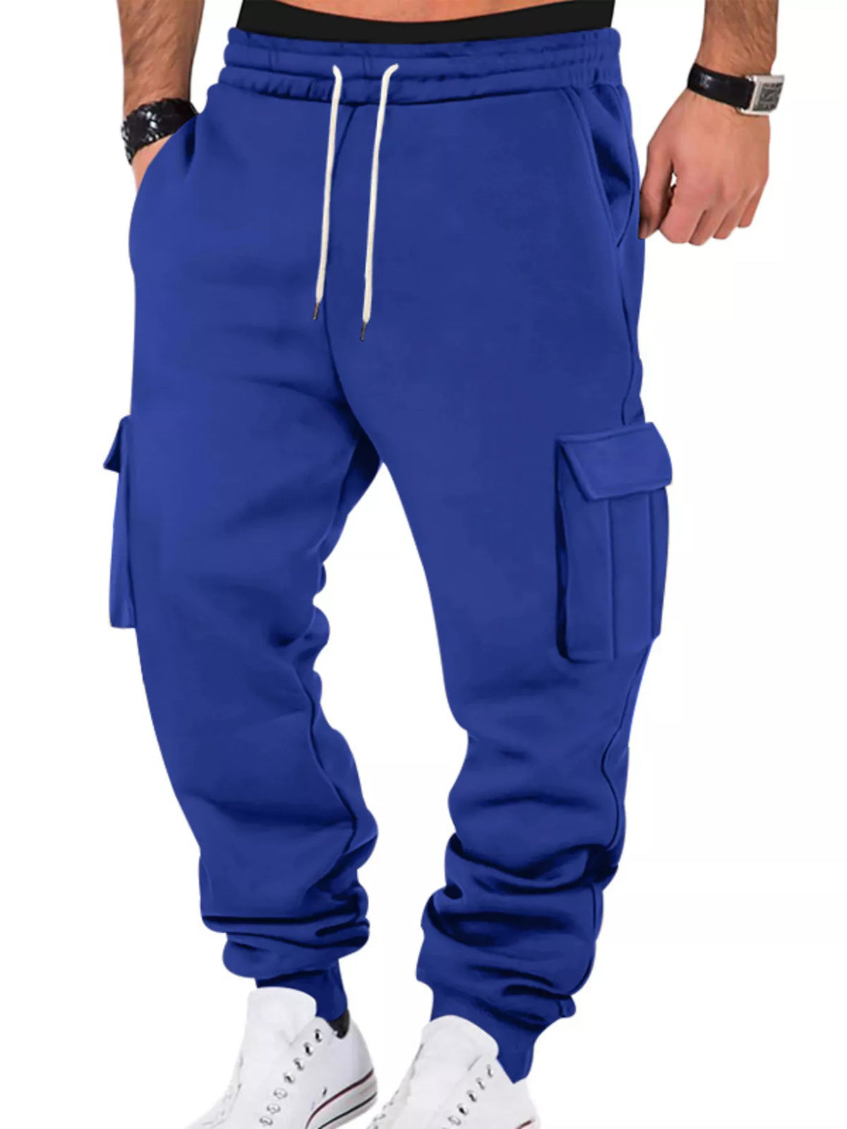 Model wearing royal blue cargo joggers, front view