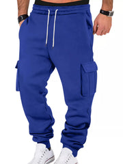 Model wearing royal blue cargo joggers, front view