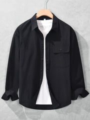 Black long-sleeve men's button-up shirt shown from the front with collar and chest pocket