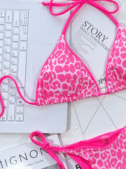 Close-up of pink leopard-print bikini top