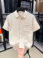 Cream textured shirt shown front-on with its hem held up