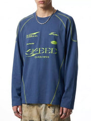 Model wearing navy long-sleeve T-shirt with lime SPEED graphics and contrast seams