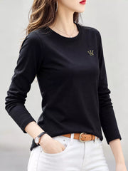 Model wearing black crown-embroidered long-sleeve T-shirt