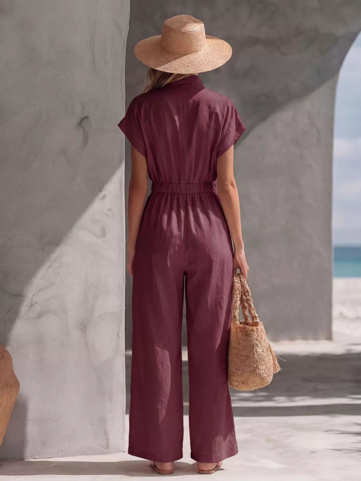 Women's zip-front wide-leg jumpsuit, burgundy back view