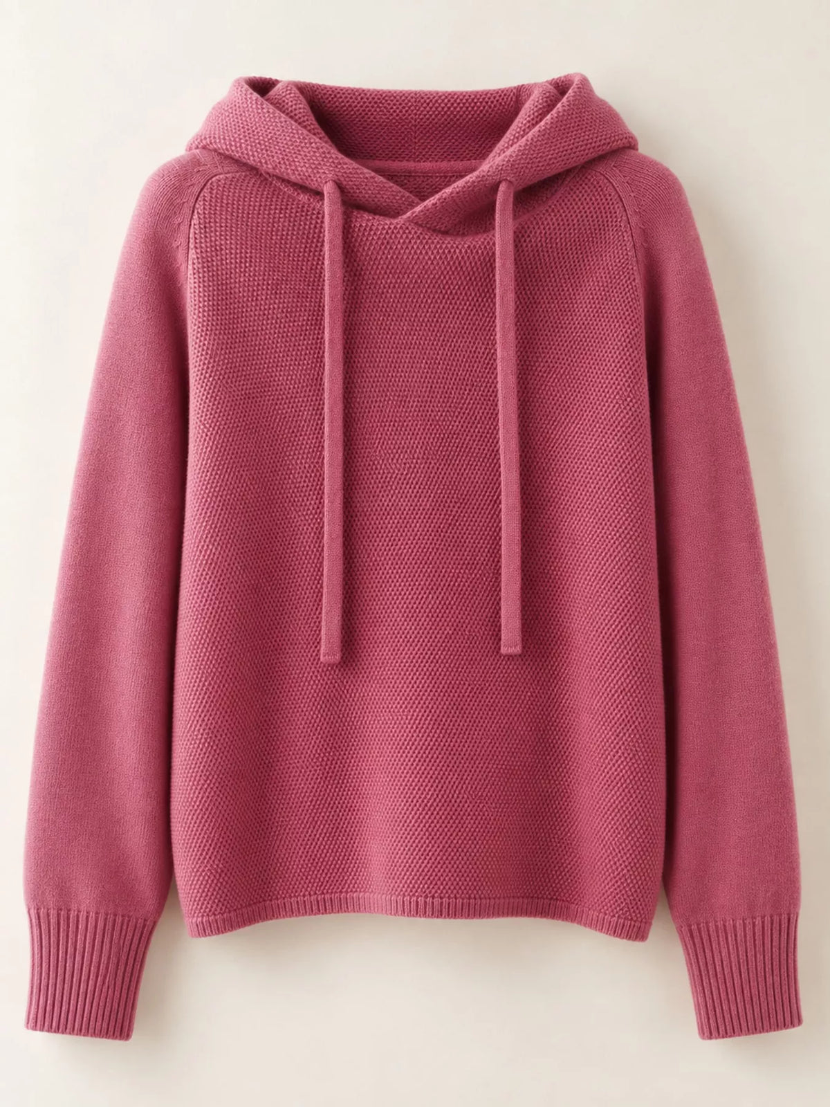 Dusty pink drawstring hooded sweater displayed alone against a pale background.