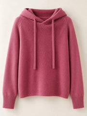 Dusty pink drawstring hooded sweater displayed alone against a pale background.