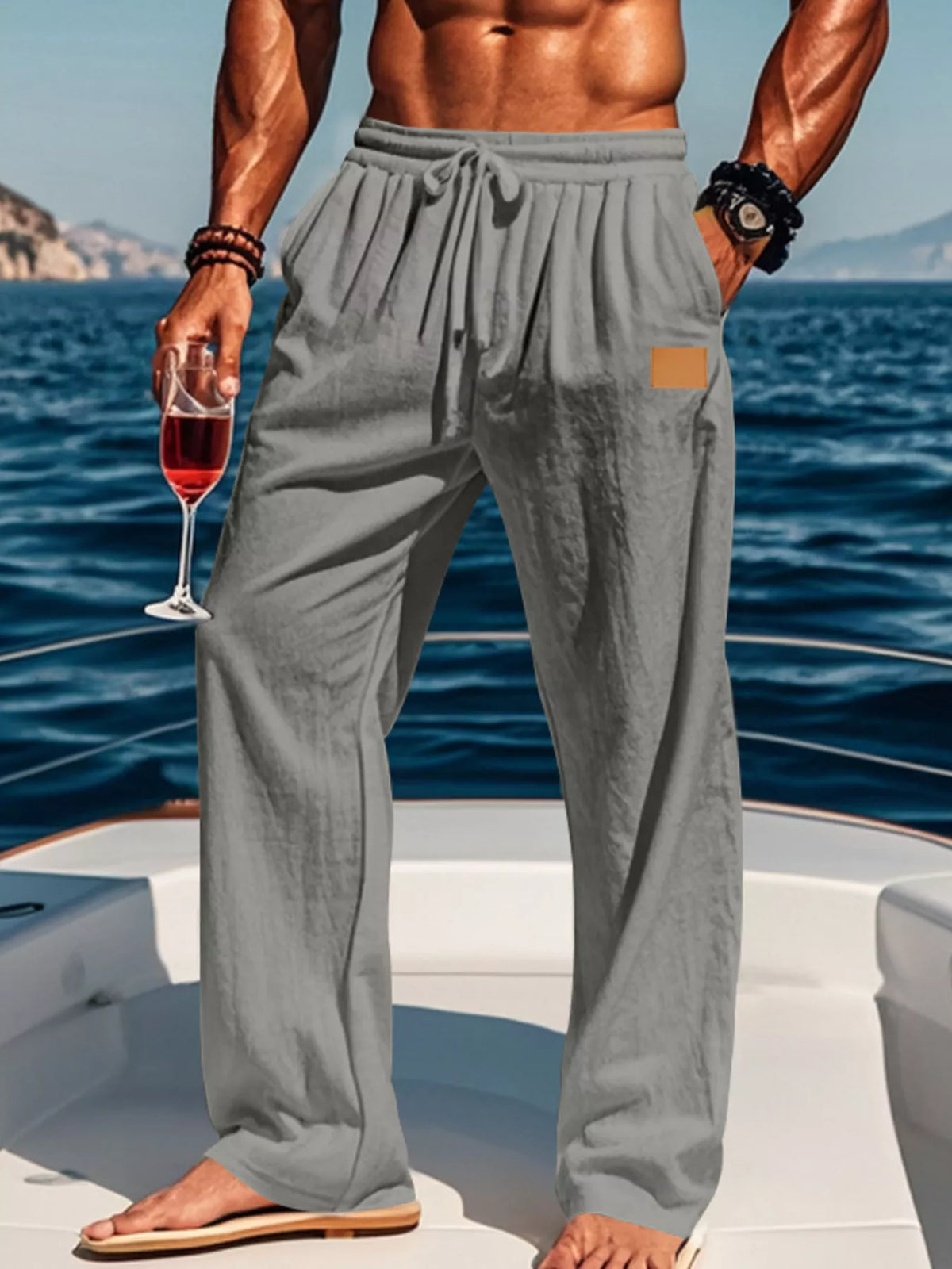 Model wearing gray wide-leg drawstring pants