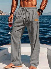 Model wearing gray wide-leg drawstring pants