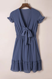 Back view of blue dress with waist tie