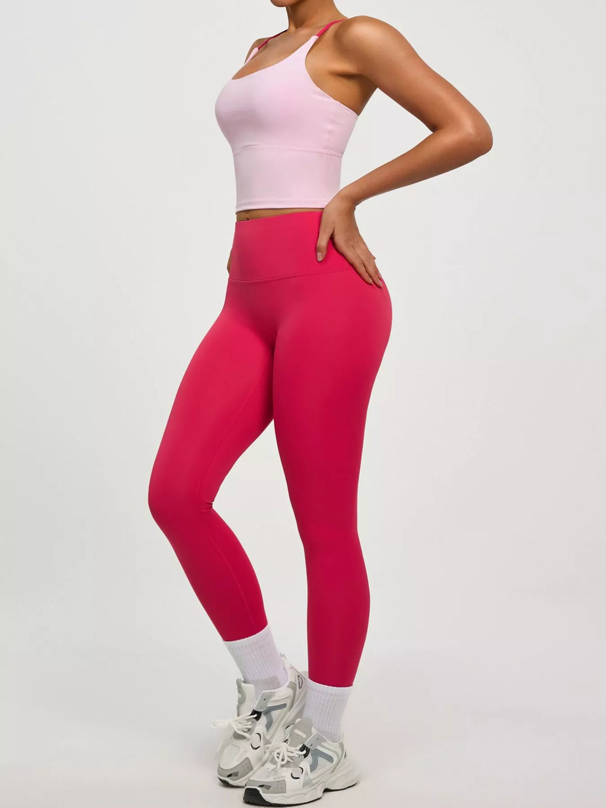 Dusty pink active bra shown from back with cross straps