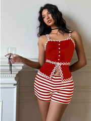Model wearing red and white striped shorts with matching top