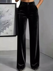Black high-waisted velvet trousers with wide legs, full front view