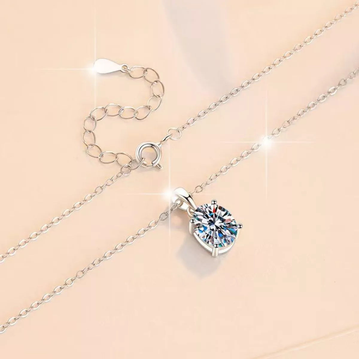 Sterling silver necklace with round moissanite pendant and extension chain