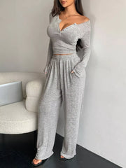 Full-length front view of light grey cropped top and drawstring wide-leg pants set