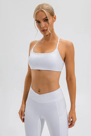 White crisscross spaghetti-strap active cami and leggings