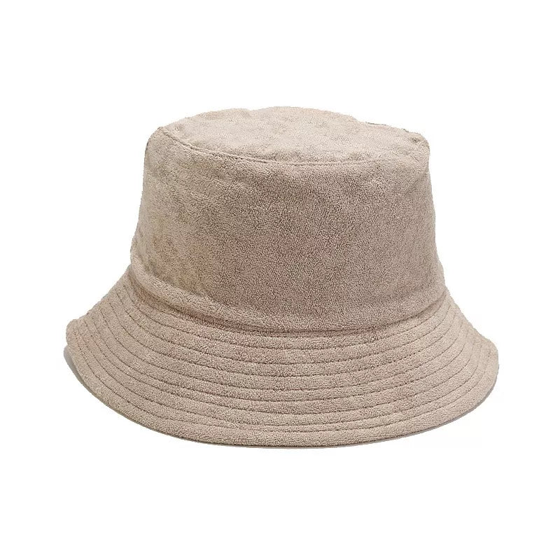 Khaki wide-brim bucket hat shown from the front