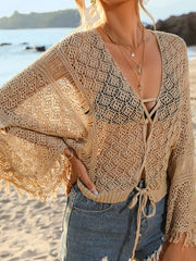 Close view of tan crochet cover-up neckline and tie front