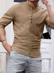 Model wearing tan shirt with short button placket