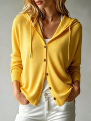 White hooded button-down cardigan with drawstrings, front view