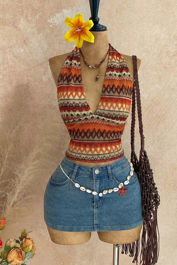 Orange geometric-print halter cami front on mannequin with denim shorts