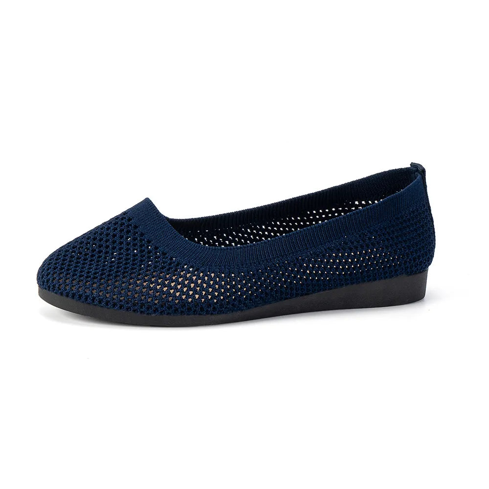 Blue mesh flat slip-on in side profile