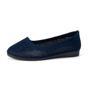 Blue mesh flat slip-on in side profile