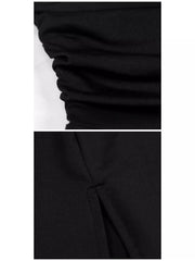 Close detail of black dress gathered bodice and ruched fabric
