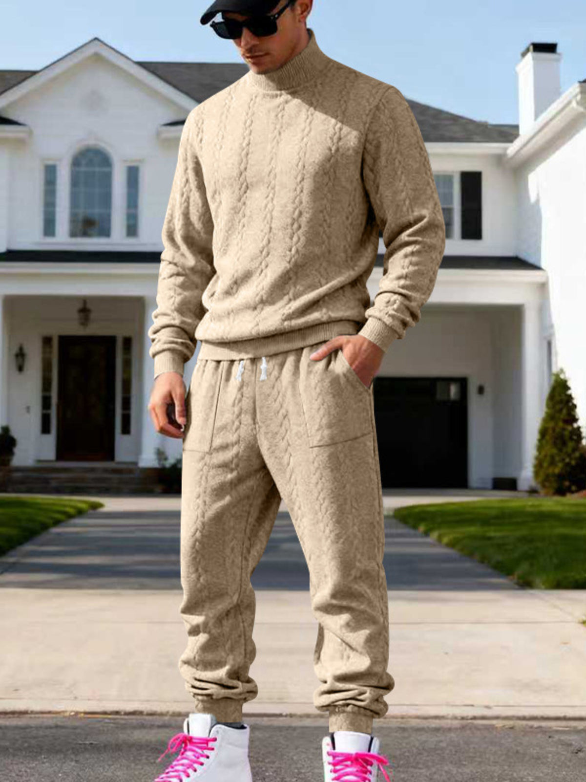 Beige cable-knit mock-neck sweater and joggers worn front-facing.