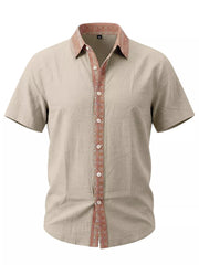 Beige shirt with rust contrast trim shown on white background