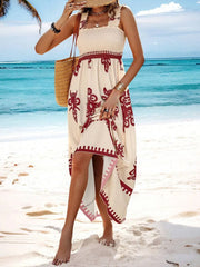 Model wearing burgundy and cream floral maxi dress