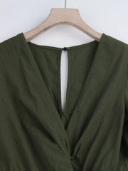 Olive romper back neckline and button detail