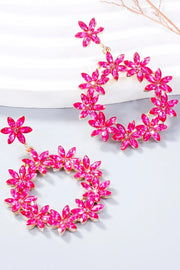 Pair of bright pink rhinestone flower dangle earrings