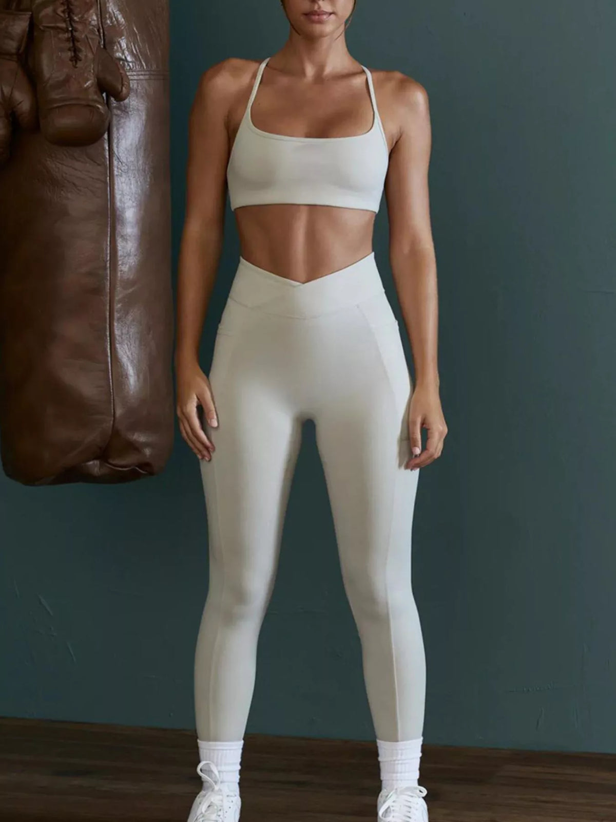 Back view of seamless cross-waist cami and leggings active set