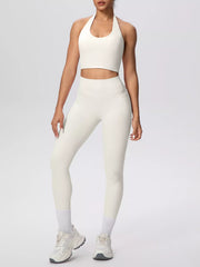 Front view of white halter crop top and leggings