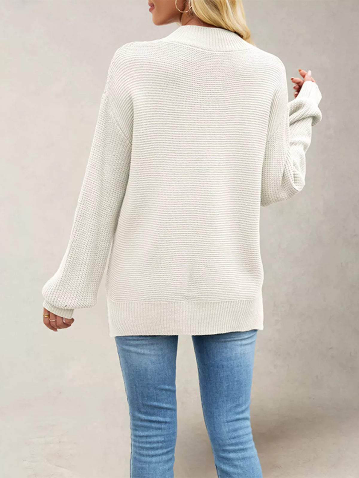 Women’s ribbed mock-neck drop-shoulder sweater in ivory back view