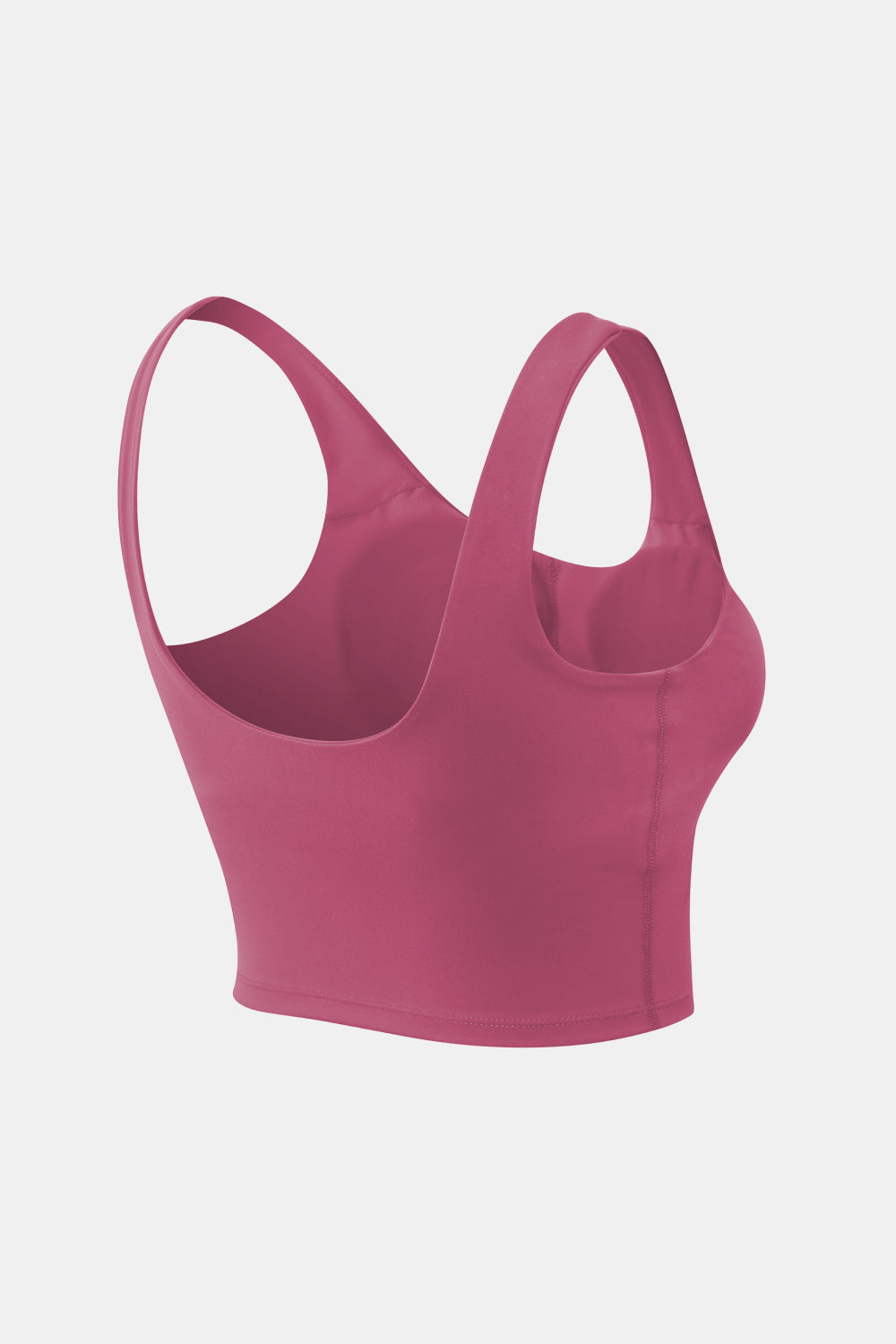 Rose pink cropped tank top viewed from the back at a three-quarter angle