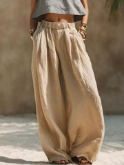 Beige wide-leg pants with elastic waist shown full length